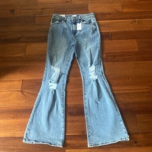 NWT high rise, slim fit, flare leg distressed jeans